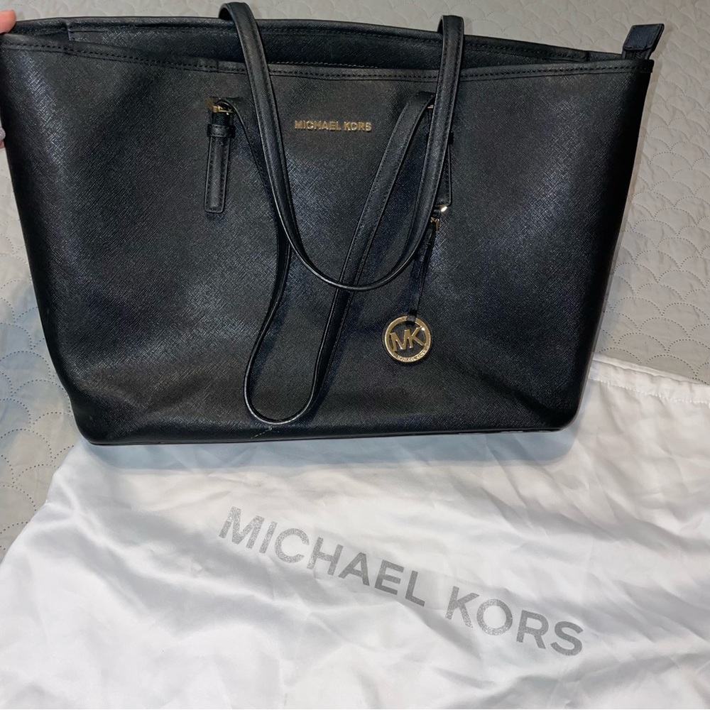 Michael Kors sectional tote in Black w/ Gold detail and white protective bag!